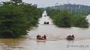 Taiwan braces for powerful typhoon after floods in China kill dozens