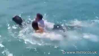 Flight crash lands into sea as terrified passengers forced to swim to safety