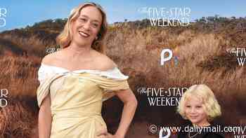 Chloe Sevigny's rarely-seen lookalike son Vanja, six, wins hearts as he carries her train during red carpet debut