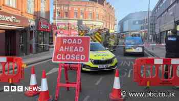 Dozens of firefighters tackle building blaze