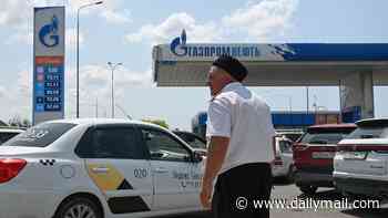 Guards are brought in to keep order as huge queues form at Russian petrol stations following wave of successful Ukrainian attacks on refineries