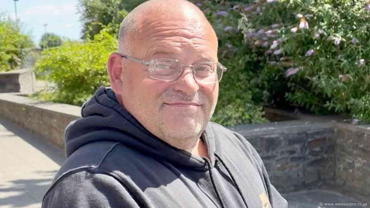 Man masking face with scarf caught in fuel station scam