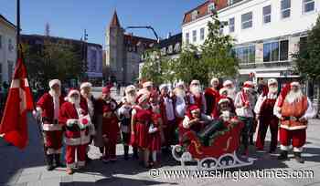 Santa convention brings Christmas cheer to the height of summer