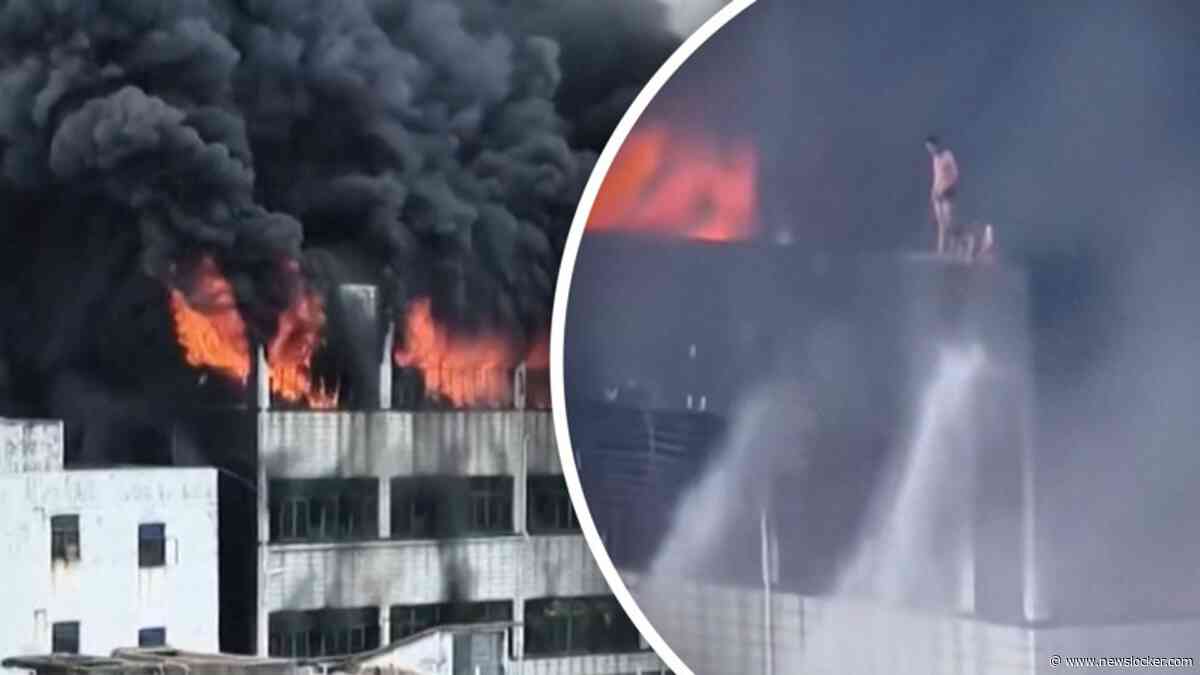 Grote brand in Chinese fabriek: werknemers vluchten in paniek het dak op