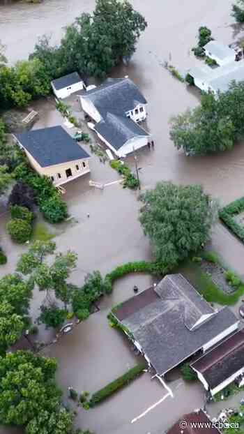 What caused the devastating flooding in parts of Manitoba?