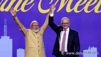 Narendra Modi celebrates 'Indianness' of raucous Melbourne crowds after signing a uranium deal with Albanese