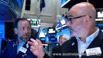 Wall Street gains as chip surge offsets Iran concerns
