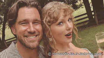 Taylor and Travis SPOTTED after romantic honeymoon
