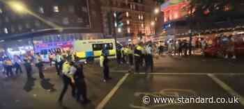 Fans riot in London with bottles hurled at police after France beat Morocco in World Cup