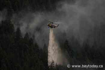 Boston Bar, B.C., residents look on as wildfire burns near small highway community