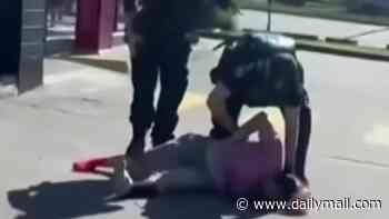 Shocking moment woman allegedly tries to abduct a three-year-old in a KFC car park