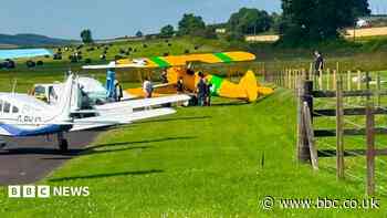 Armed police respond to plane crashing into other aircraft after skidding off runway