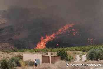 One of Spain's deadliest wildfires has killed at least 12 people, with 23 others missing