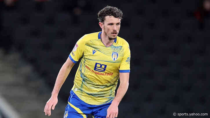 Colchester captain Flanagan announces retirement