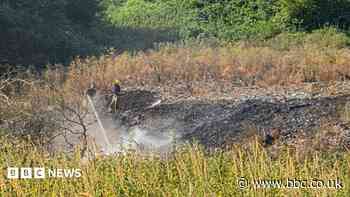 Firefighters called to blaze at illegal waste dump