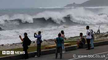 East Asia braces for destructive typhoon as landslides kill 15 in Philippines