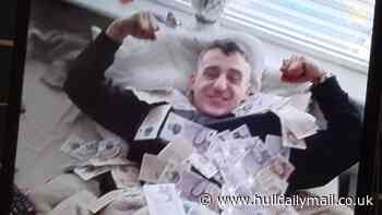The money shot: Cocky Class A drug dealer boasting with the proceeds of his crimes