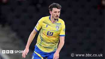 Colchester captain Flanagan announces retirement