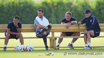 Unlucky Jordan Henderson watches England training session in a cast as Three Lions star is seen for the first time since surgery after he 'completely smashed his forearm' in freak accident during Azteca celebrations