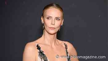 Charlize Theron, 50, stuns in plunging lace gown on red carpet