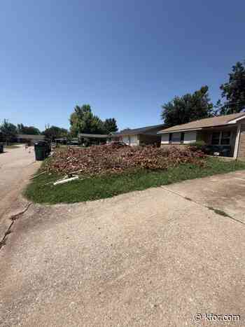 OKC homeowner claims OG&E contractor left yard covered in tree limbs