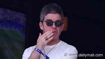 Noel Gallagher looks tense as he joins Penelope Cruz and Javier Bardem at the Spain vs Belgium World Cup quarter-final match