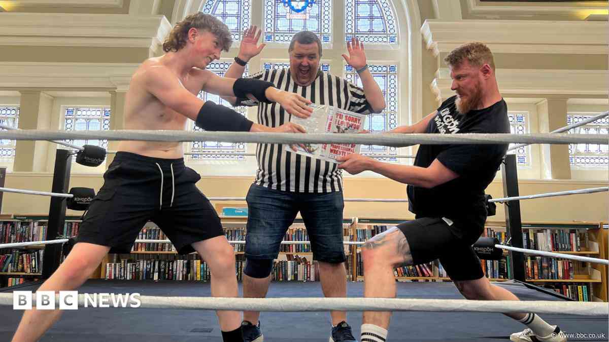 Worlds of wrestling and reading collide at library
