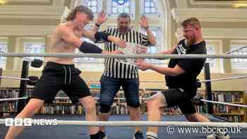 Worlds of wrestling and reading collide at library