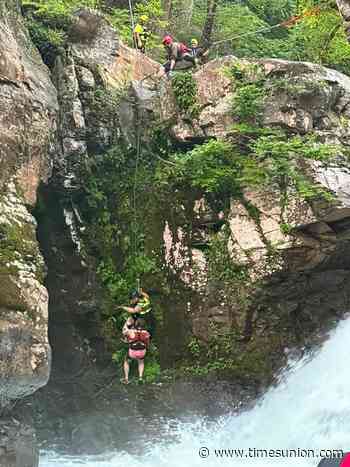 Woman and dog rescued after perilous ordeal at Catskills waterfall
