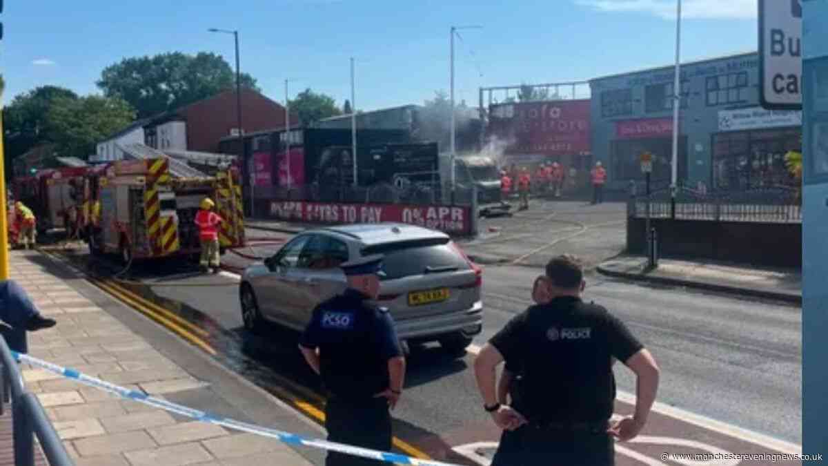 Smoke billows from huge Sofa Superstore fire after van and lorry burst into flames in car park