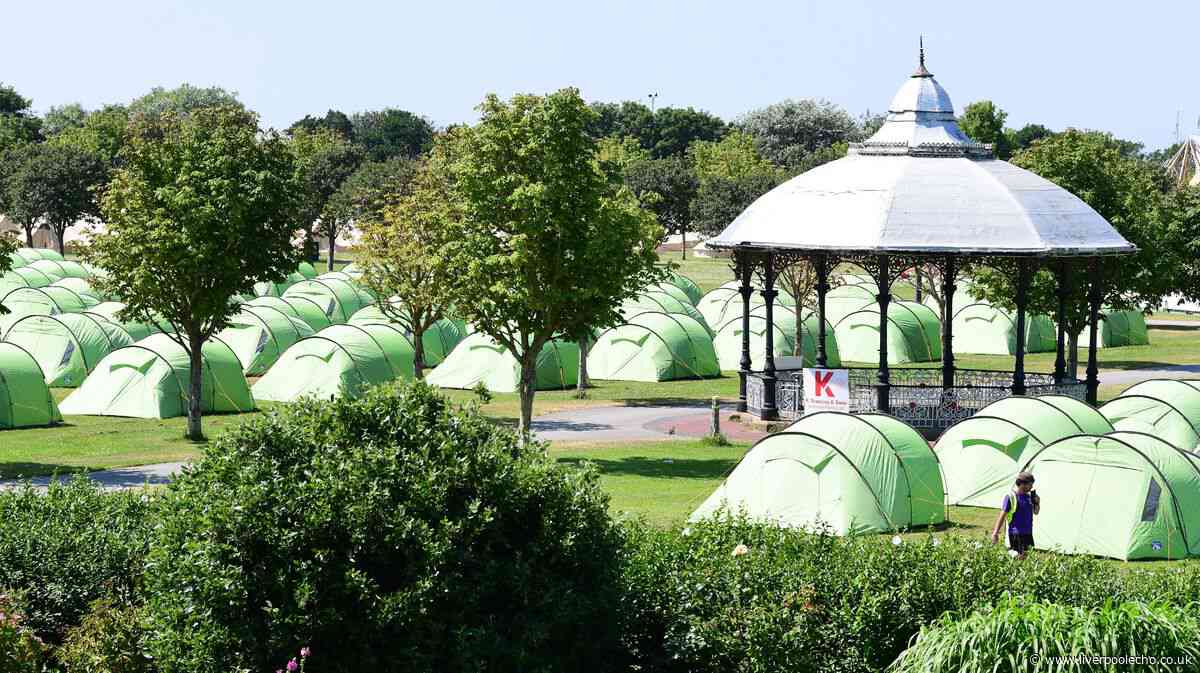 Dozens of tents appear at Merseyside park