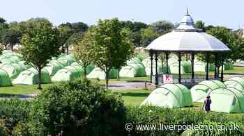 Dozens of tents appear at Merseyside park