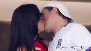 Brad Pitt FINALLY gets a kiss from Ines de Ramon at World Cup after she was accused of 'pulling away from him'