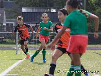Elementary students play in mock World Cup fund-raiser