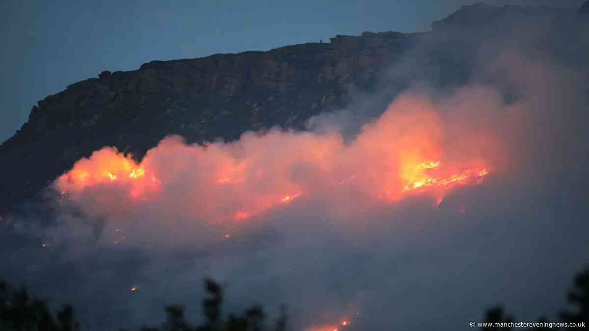 Dovestone moor fire LIVE as residents report 'loud bangs' before huge plumes of smoke seen billowing across beauty spot