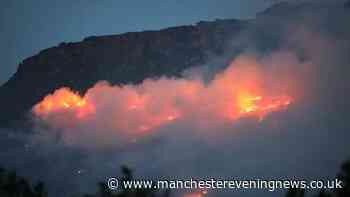 Dovestone moor fire LIVE as residents report 'loud bangs' before huge plumes of smoke seen billowing across beauty spot