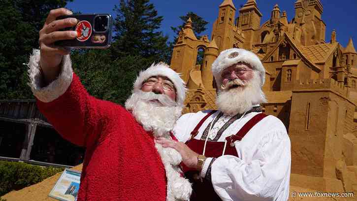 It's Christmas in July as hundreds of Santas go on the march in the middle of a stifling summer heat wave