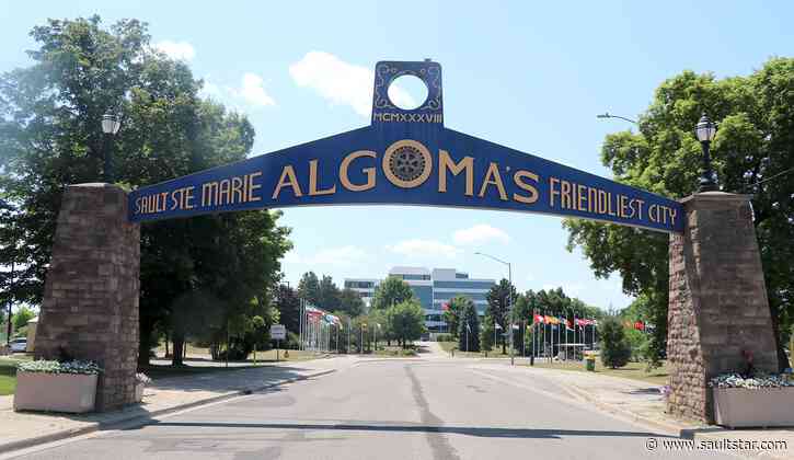 Rotary takes time to fix welcome arch clocks