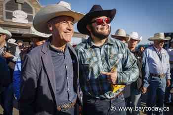 'It's looking good': Carney chats pipelines while mingling at Calgary Stampede