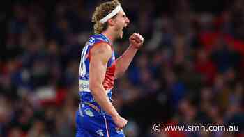 AFL LIVE: ‘Air’ Naughton soaring for Dogs against Eagles; poncho-clad spectators return to the MCG