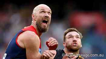 AFL LIVE: Kozzy flies high, Demons soaring against Richmond; MCG falls silent for Nathan Fitzgerald
