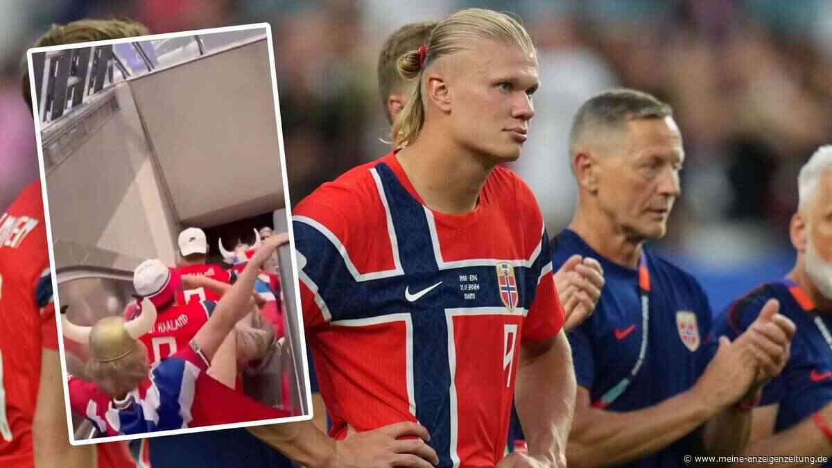 Norwegische Fans rudern sich nach WM-Aus den Weg durch den Flughafen