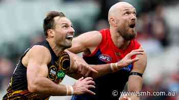 Demons down Tigers, boast ominous MCG season record as both clubs remember Nathan Fitzgerald