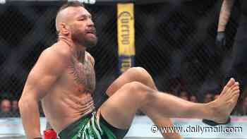 Conor McGregor 'in hell' after losing inside ONE MINUTE on his UFC return: Irishman insists his brutal injury is new, despite bizarre pre-fight footage emerging