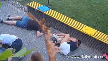 Terrifying moment people hurl themselves to ground when Russian strike lands near Ukraine coffee shop - as four killed in overnight attack