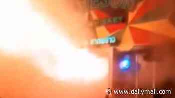 At least 27 dead after massive fire breaks out in pub in Bangkok: Shocking footage shows flames bursting from door as revellers flee