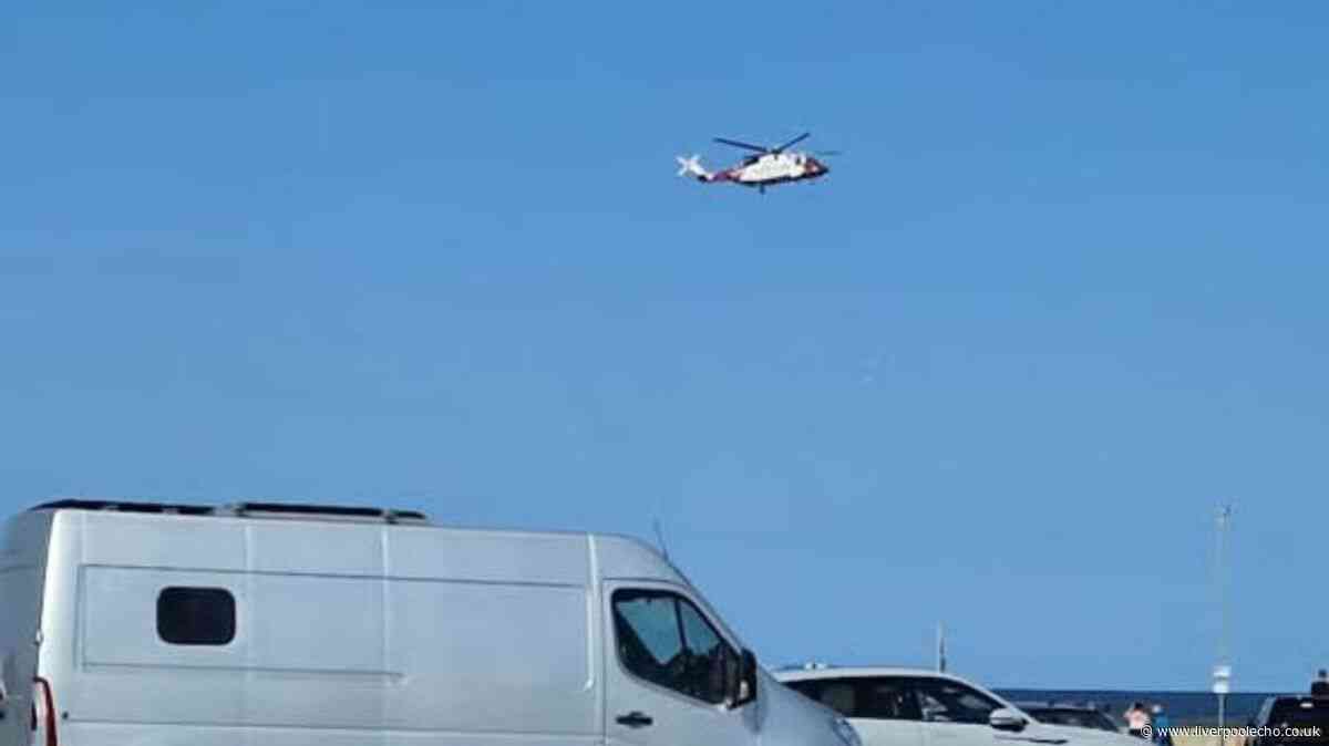 Two men die after entering sea to help children
