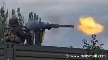 Russian soldier loses control of mounted machine gun nearly killing several of his fellow troops