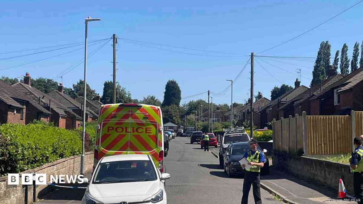Man arrested after woman found dead in flat