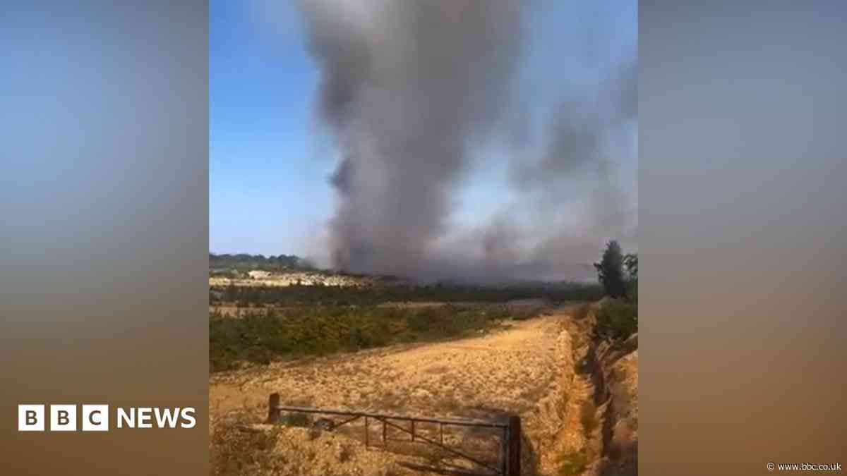 Crews still tackling hot spots at heathland fire